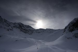 Snowy mountains with sunset